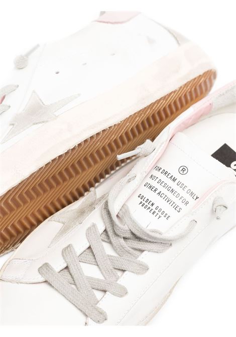 White and pink Superstar distressed lace-up sneakers Golden goose - men GOLDEN GOOSE | GWF00102F00256910914